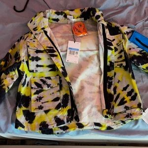 Black and yellow nike jacket with an orange pouch